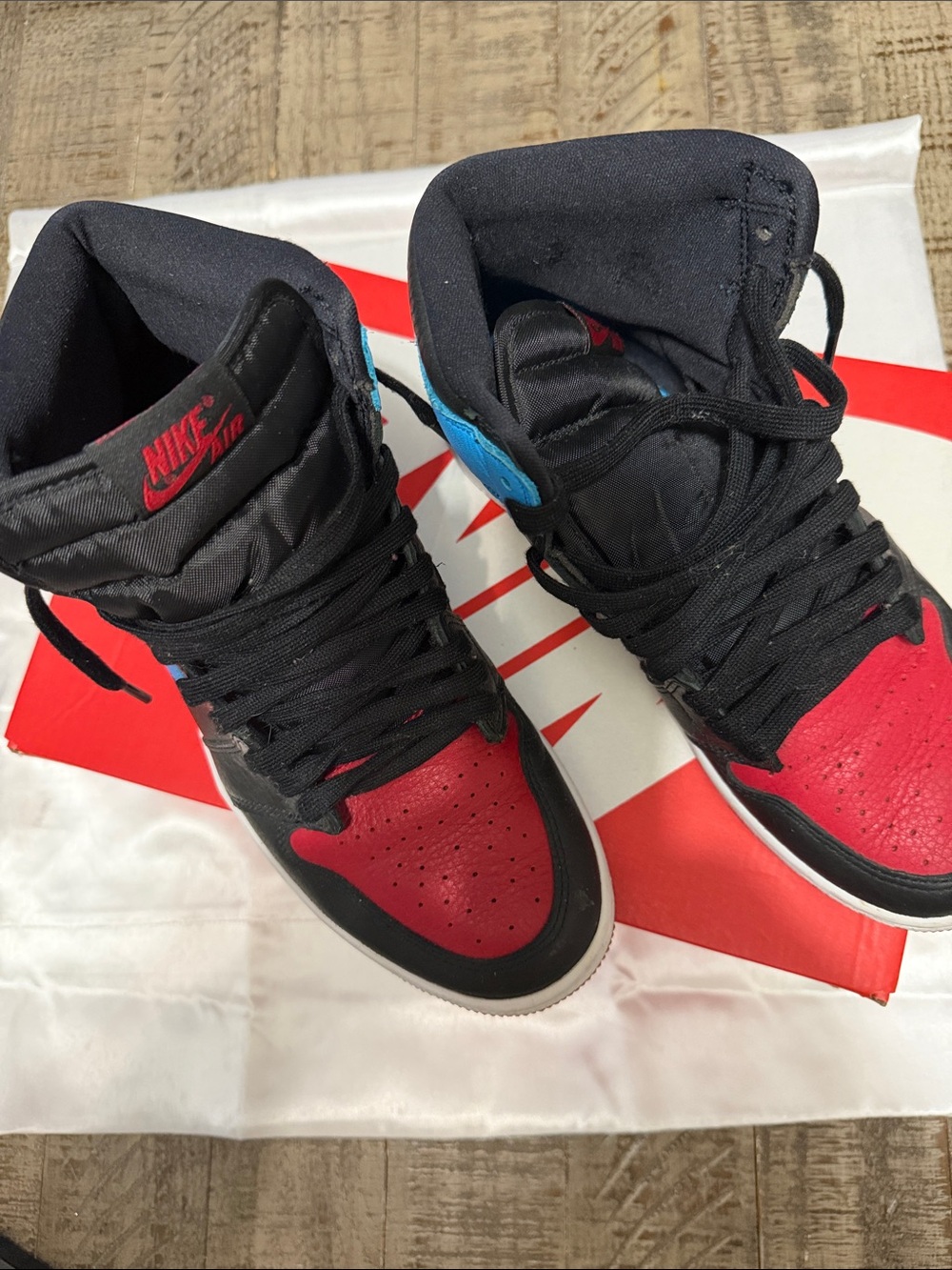 Nike Black/Red High-Top Sneakers with Blue Accent